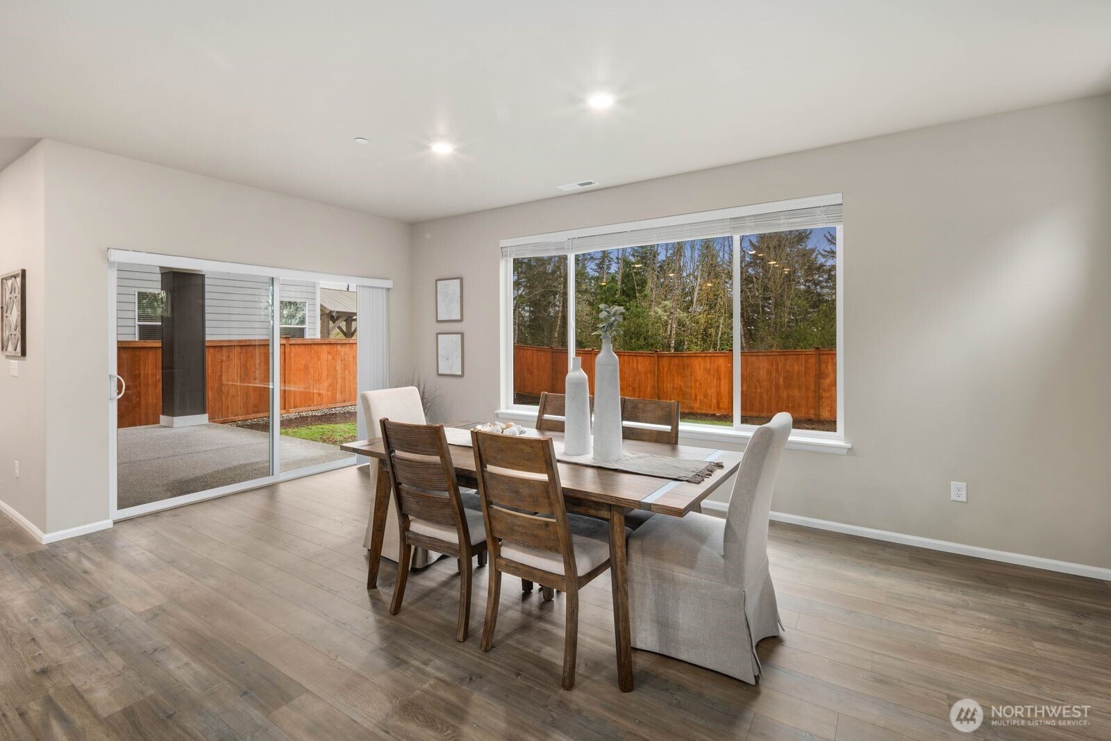 1214 Baker Hts Loop Bremerton, WA 98312 - Photo 8 of 38 a dining room with furniture and wooden floor