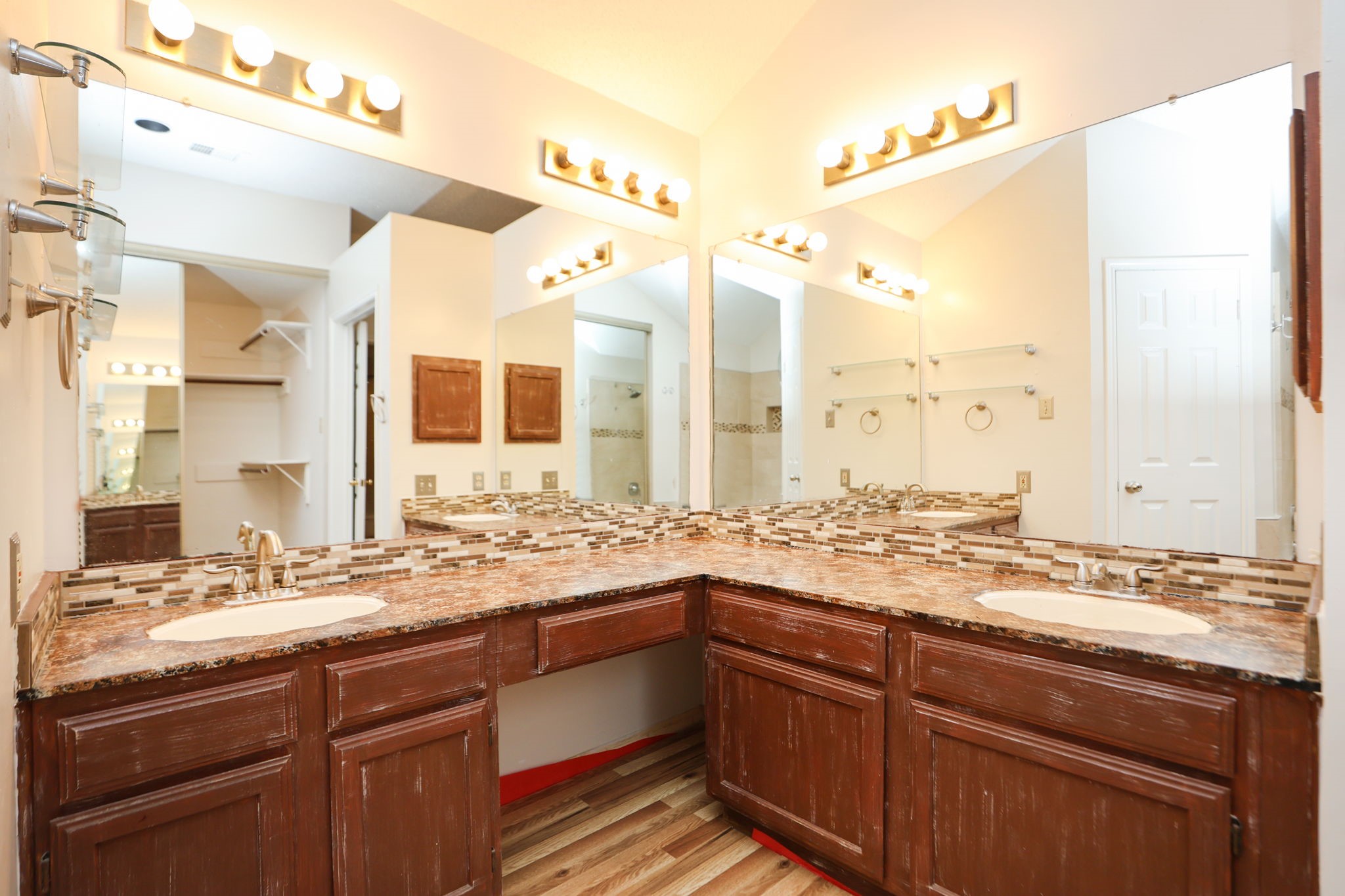 11947 Paddock Way Houston, TX 77065 - Photo 11 of 16 Primary bathroom with his and hers sinks, lots of mirrors and a well lit room!
