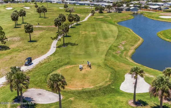 $210,000 | 916 Jacaranda Drive, Barefoot Bay, FL 32976