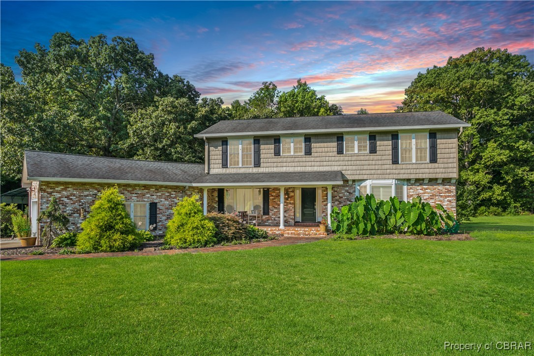 9300 Marlfield Road Gloucester, VA 23061 - Photo 1 of 50 Colonial inspired home featuring a yard