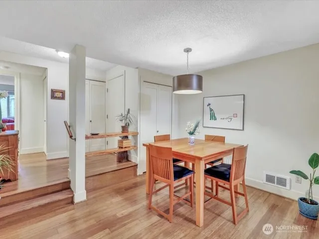 a view of a dining room with furniture