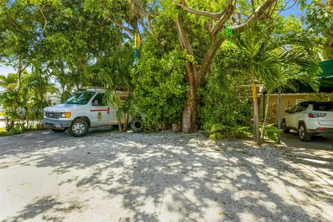 a car parked in front of a house