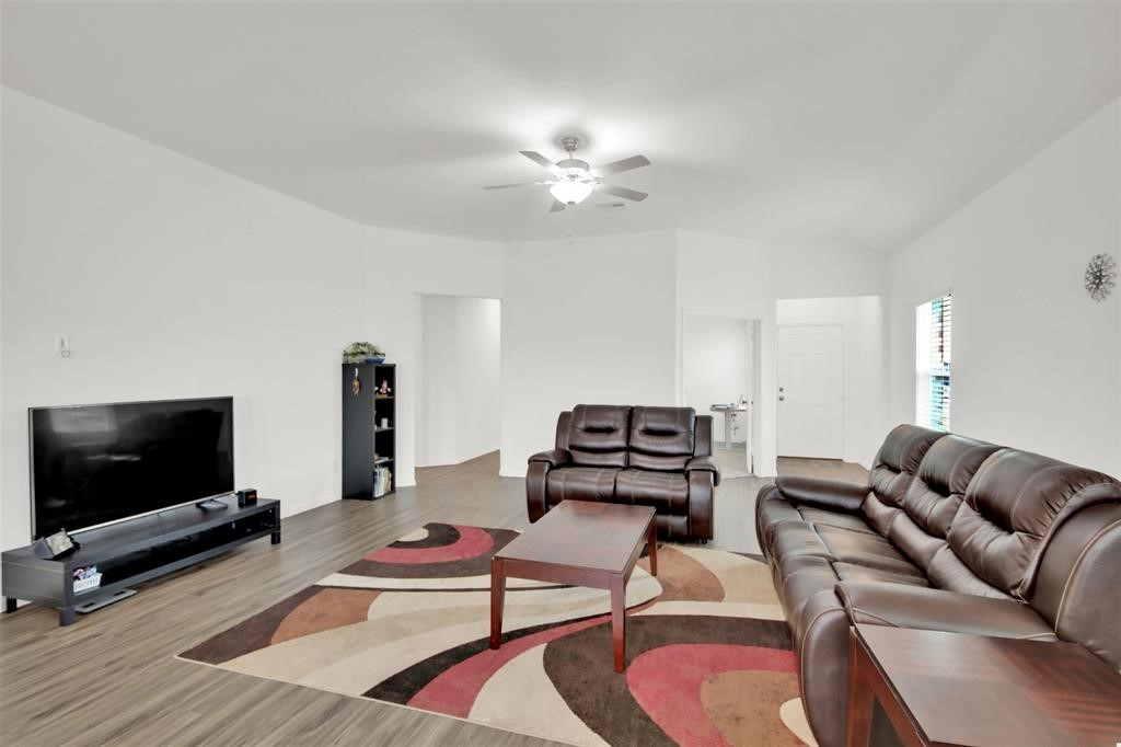 937 Mallow Road Leander, TX 78641 - Photo 12 of 30 a living room with furniture and a flat screen tv