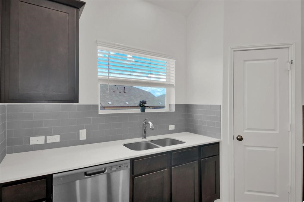 937 Mallow Road Leander, TX 78641 - Photo 19 of 30 a bathroom with a sink and a mirror