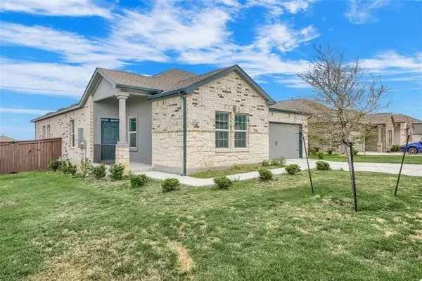 a view of backyard of house