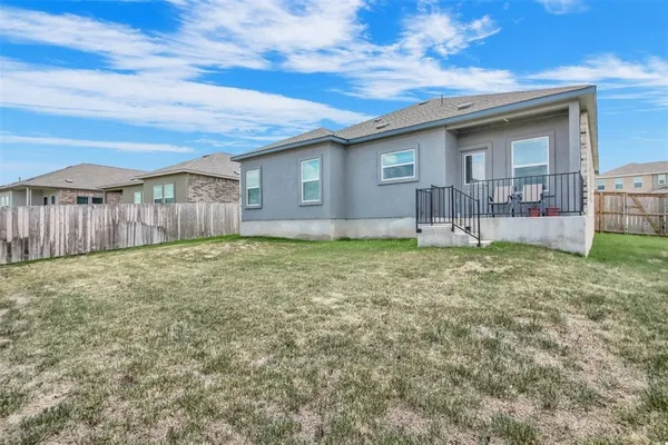 a house view with a outdoor space