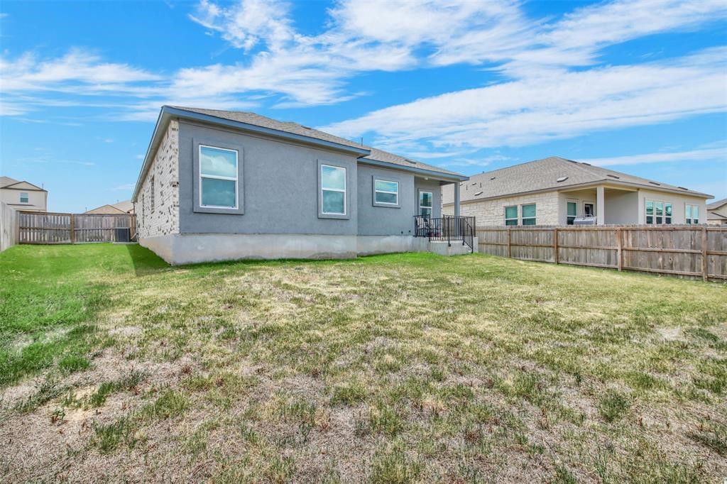 937 Mallow Road Leander, TX 78641 - Photo 6 of 30 a house view with a outdoor space