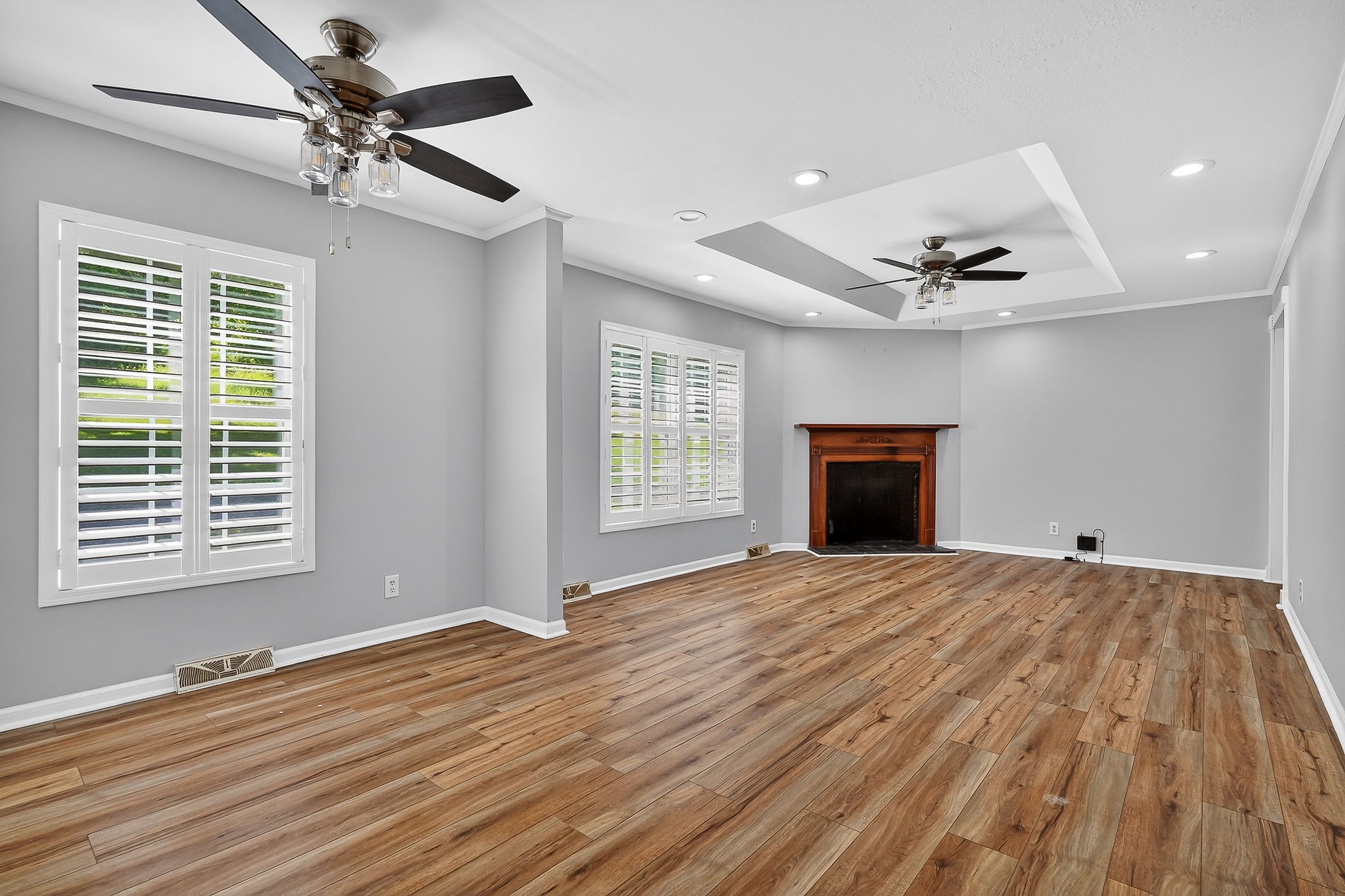 16130 Buffalo Valley Road Silver Point, TN 38582 - Photo 23 of 47 a view of an empty room with a window and wooden floor