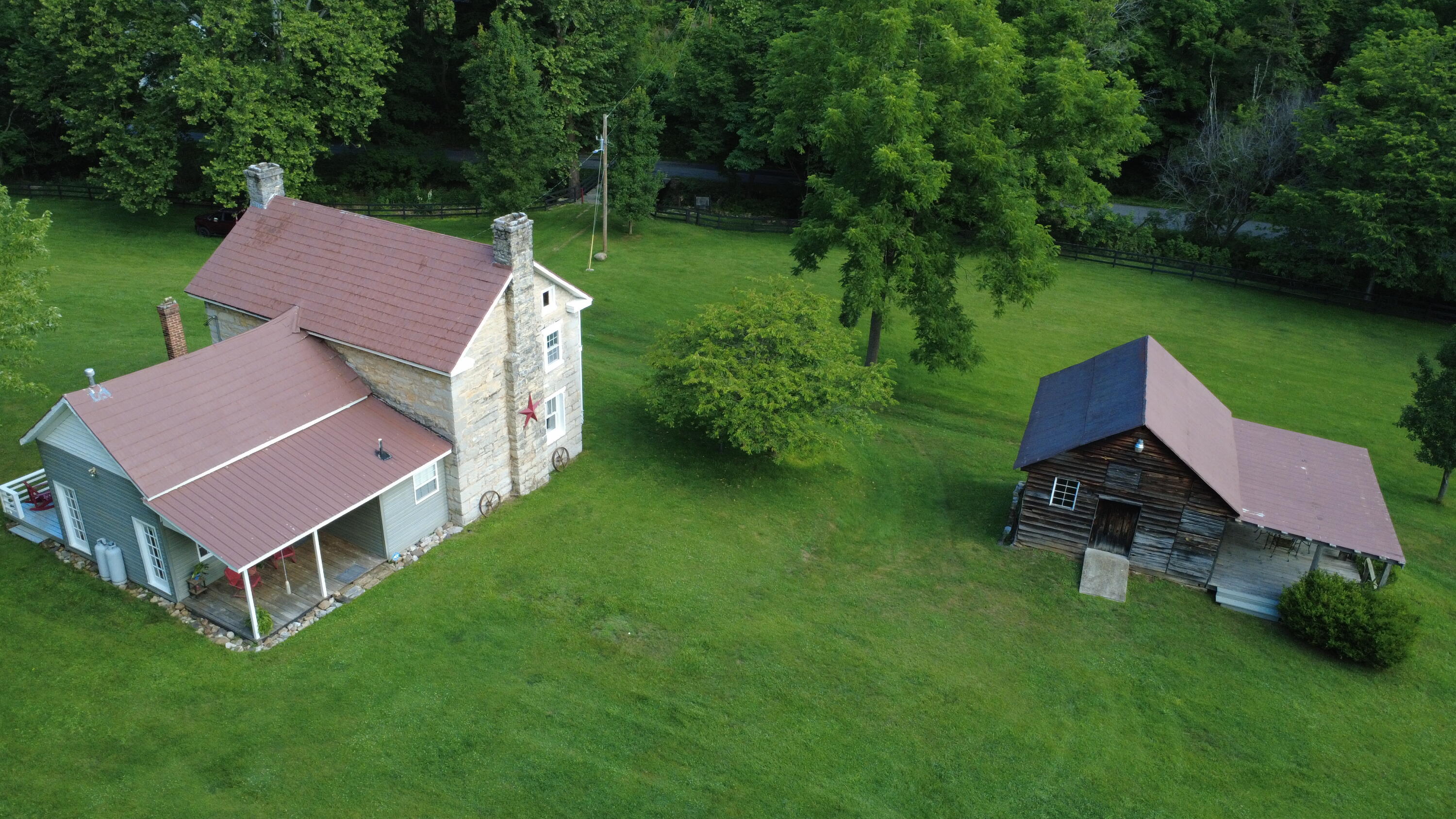 4407 Rich Patch Road Covington, VA 24426 - Photo 11 of 63 an aerial view of a house with garden space and street view