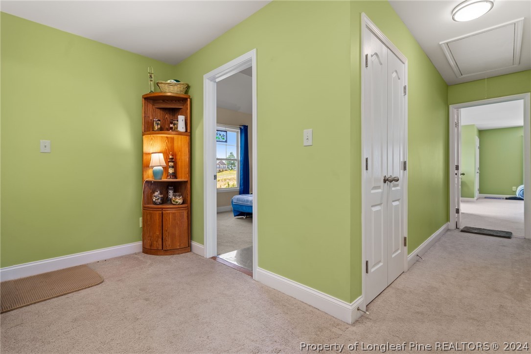 5078 Aberdeen Road Raeford, NC 28376 - Photo 17 of 46 an empty room with closet and a bathroom