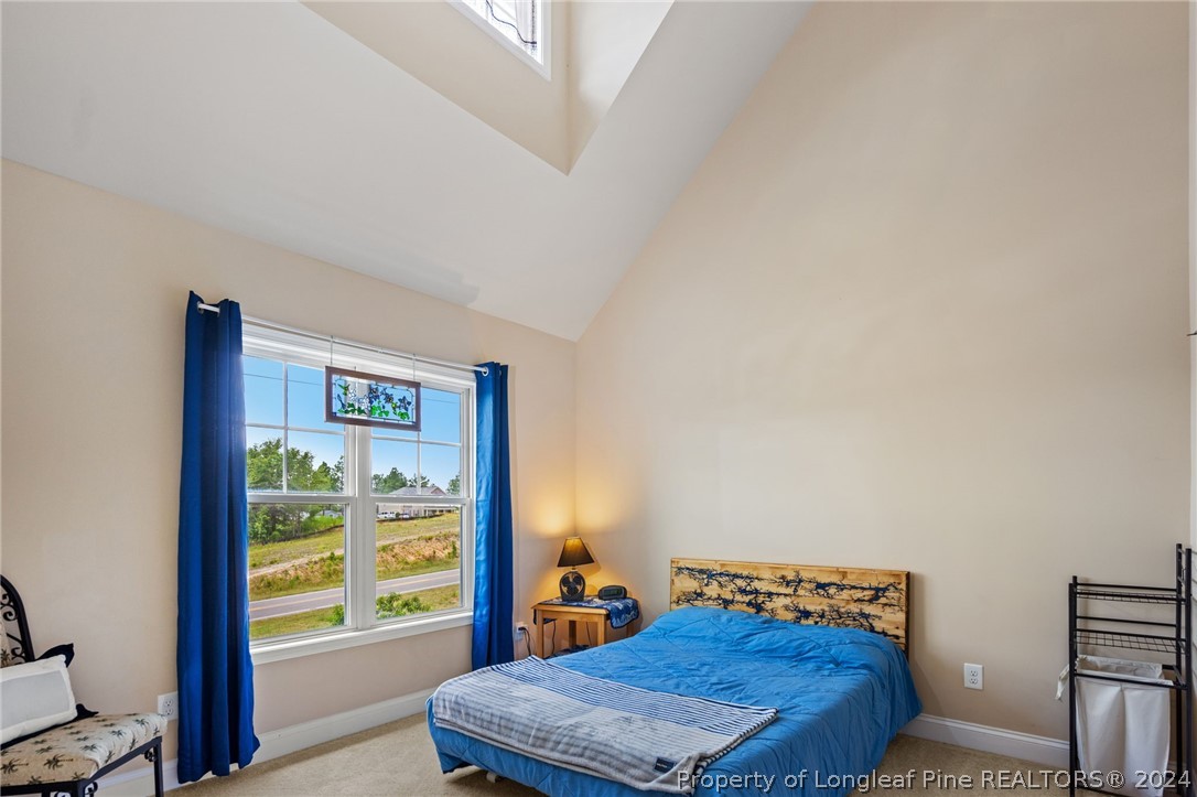 5078 Aberdeen Road Raeford, NC 28376 - Photo 20 of 46 a bedroom with a bed and a window