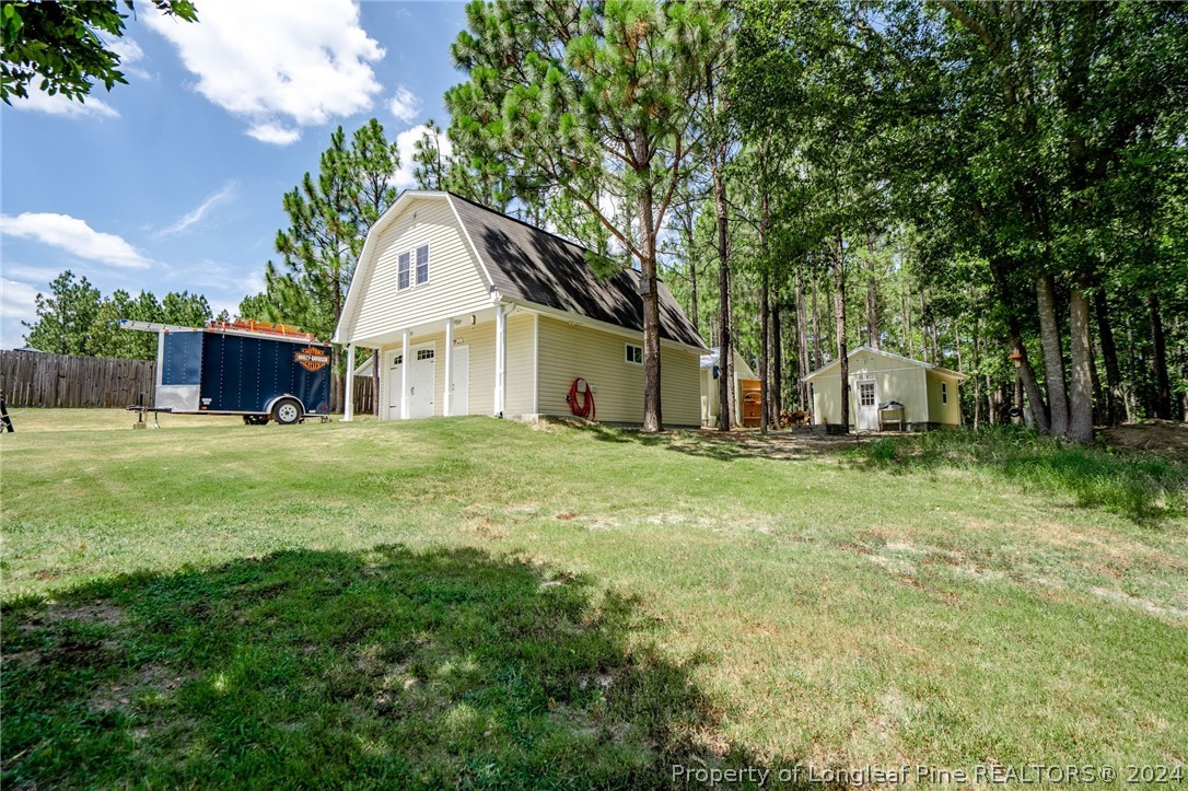 5078 Aberdeen Road Raeford, NC 28376 - Photo 30 of 46 a house view with a outdoor space