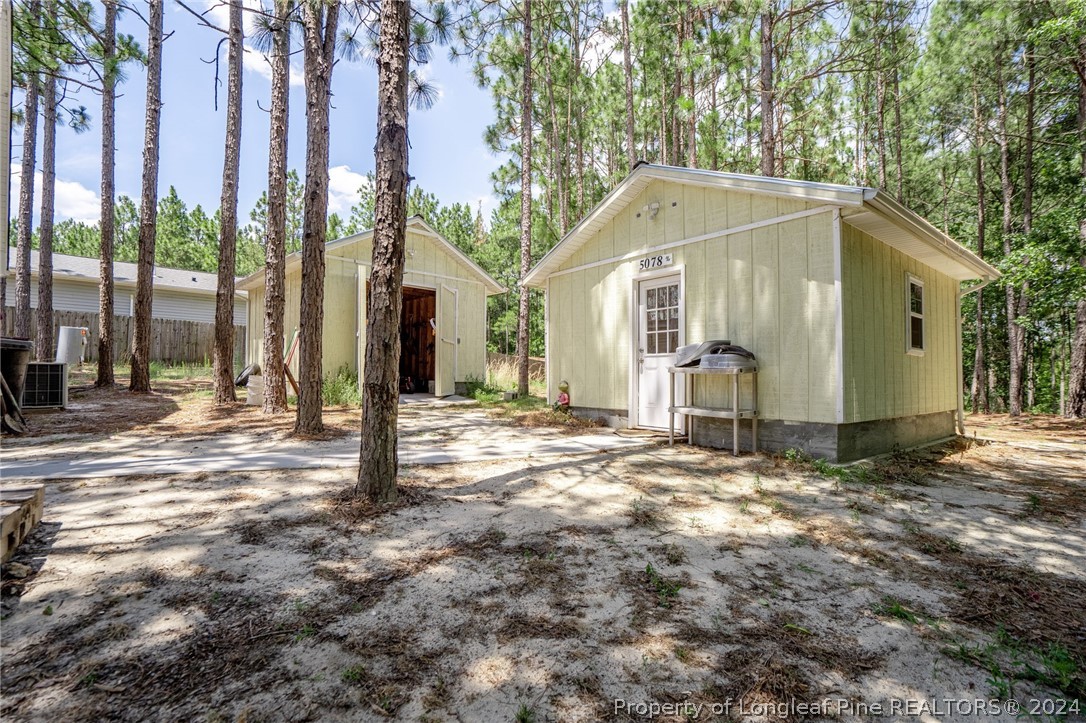 5078 Aberdeen Road Raeford, NC 28376 - Photo 36 of 46 a view of a house with a yard