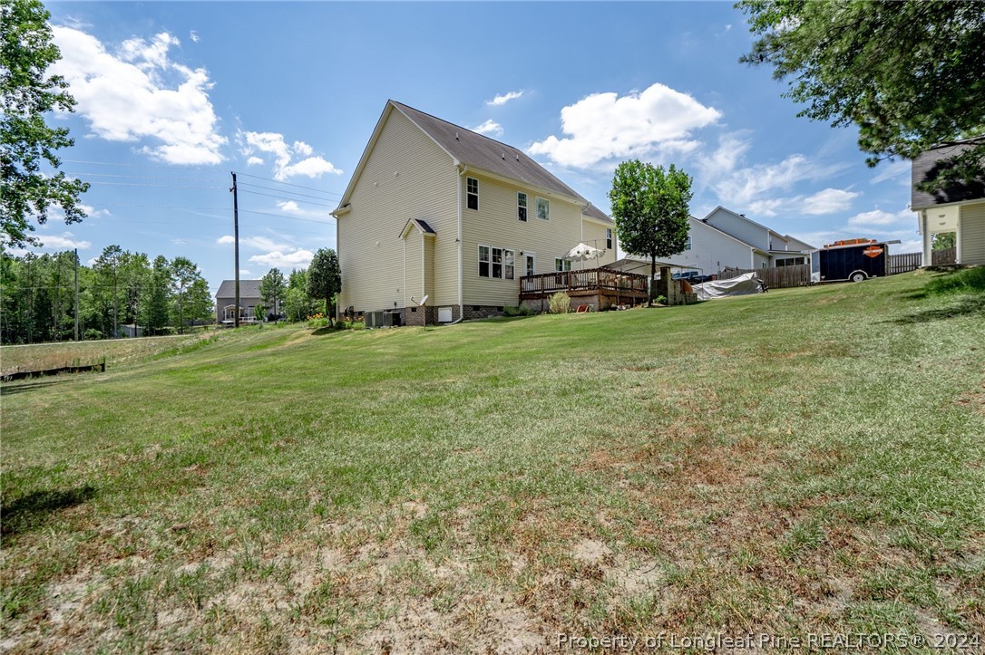 5078 Aberdeen Road Raeford, NC 28376 - Photo 41 of 46 a view of a house with a yard
