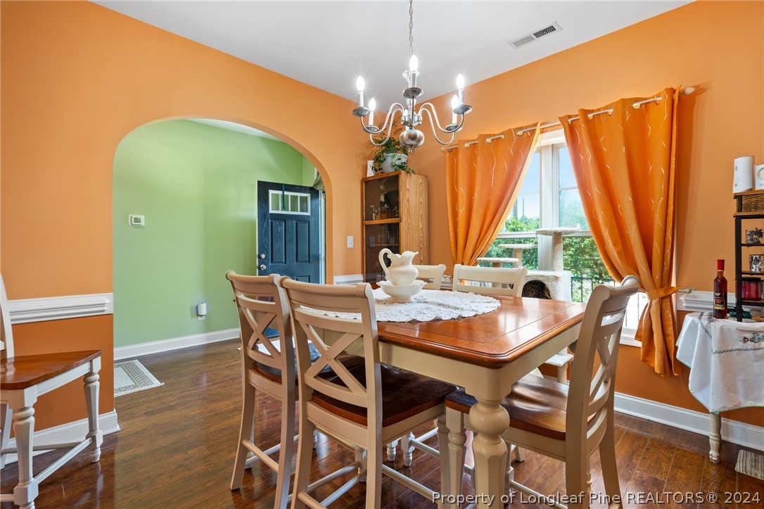 5078 Aberdeen Road Raeford, NC 28376 - Photo 5 of 46 a view of a dining room with furniture and window