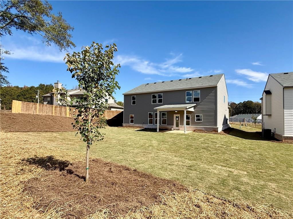 2506 Sunny Hill Road Buford, GA 30519 - Photo 24 of 25 a house view with a outdoor space