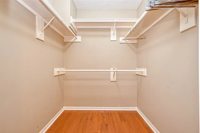 a view of a room with racks on the wall