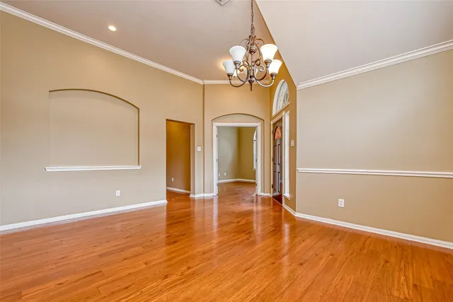 a view of a livingroom with wooden floor