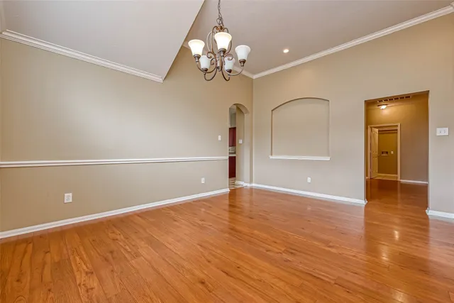 a view of a livingroom with wooden floor