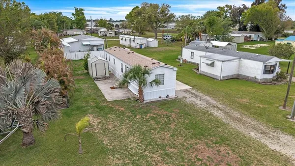an aerial view of a house with garden