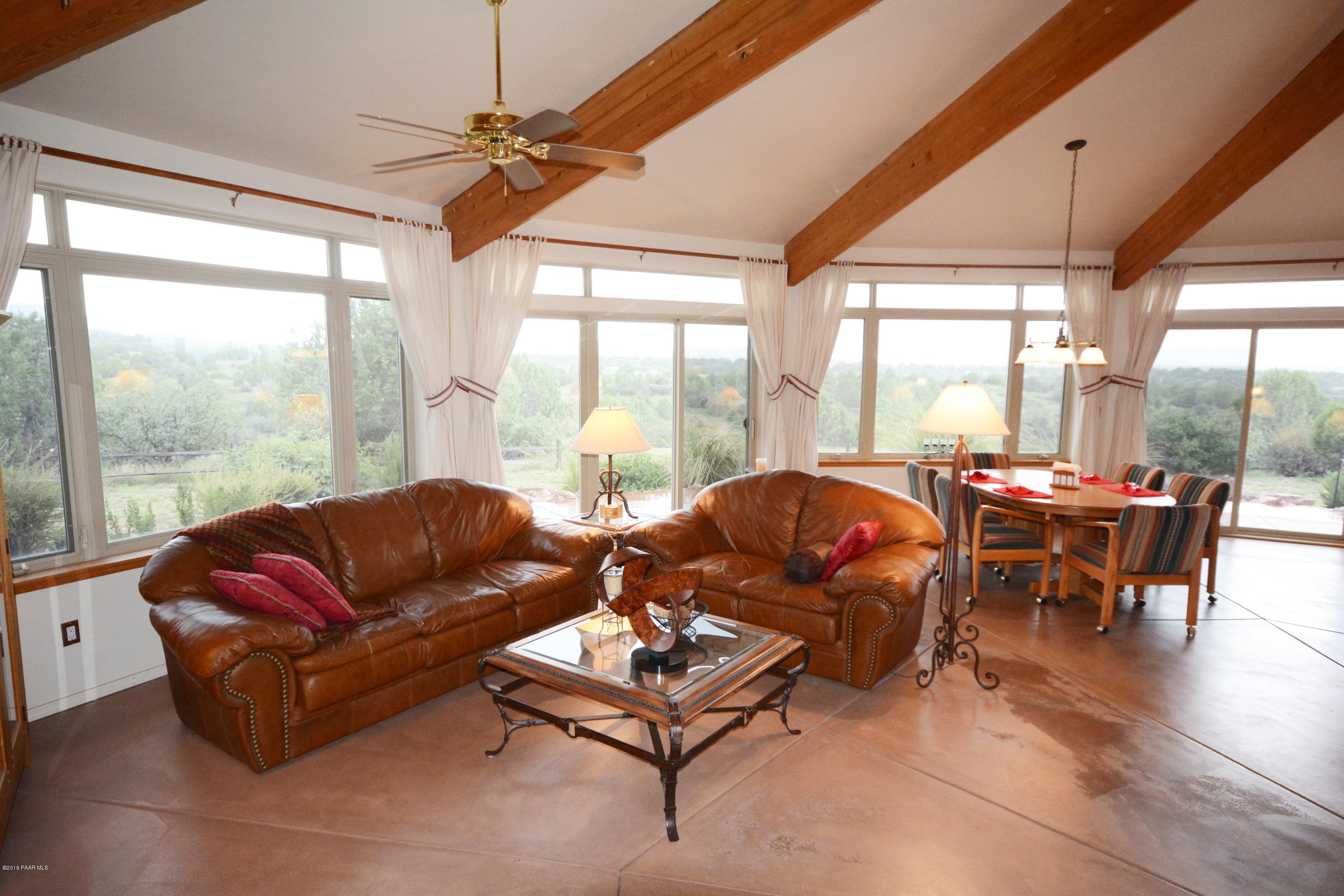 7200 Dillon Wash Road Prescott, AZ 86305 - Photo 14 of 47 a living room with furniture and a large window