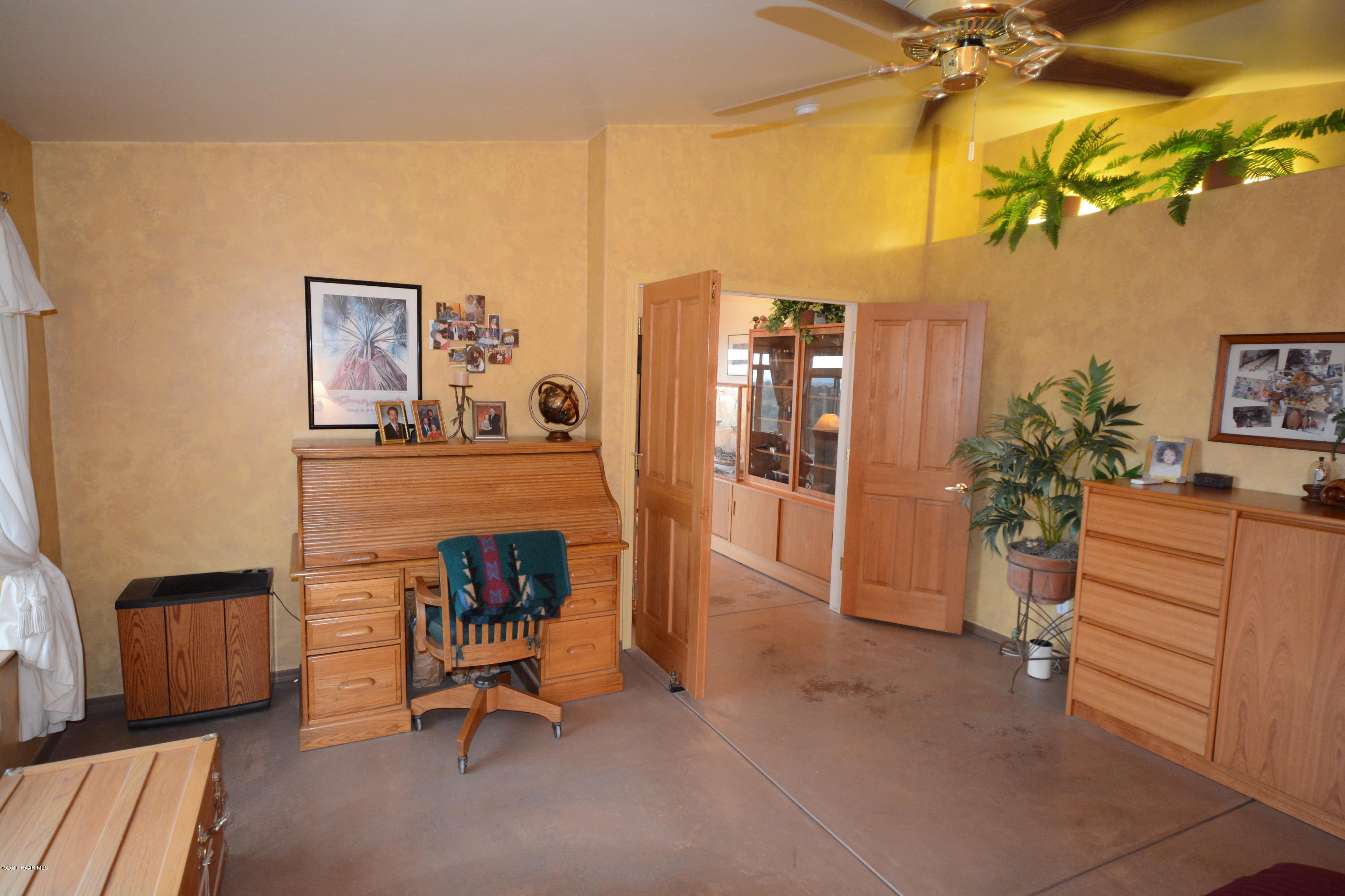 7200 Dillon Wash Road Prescott, AZ 86305 - Photo 27 of 47 a view of a livingroom with furniture and a flat screen tv