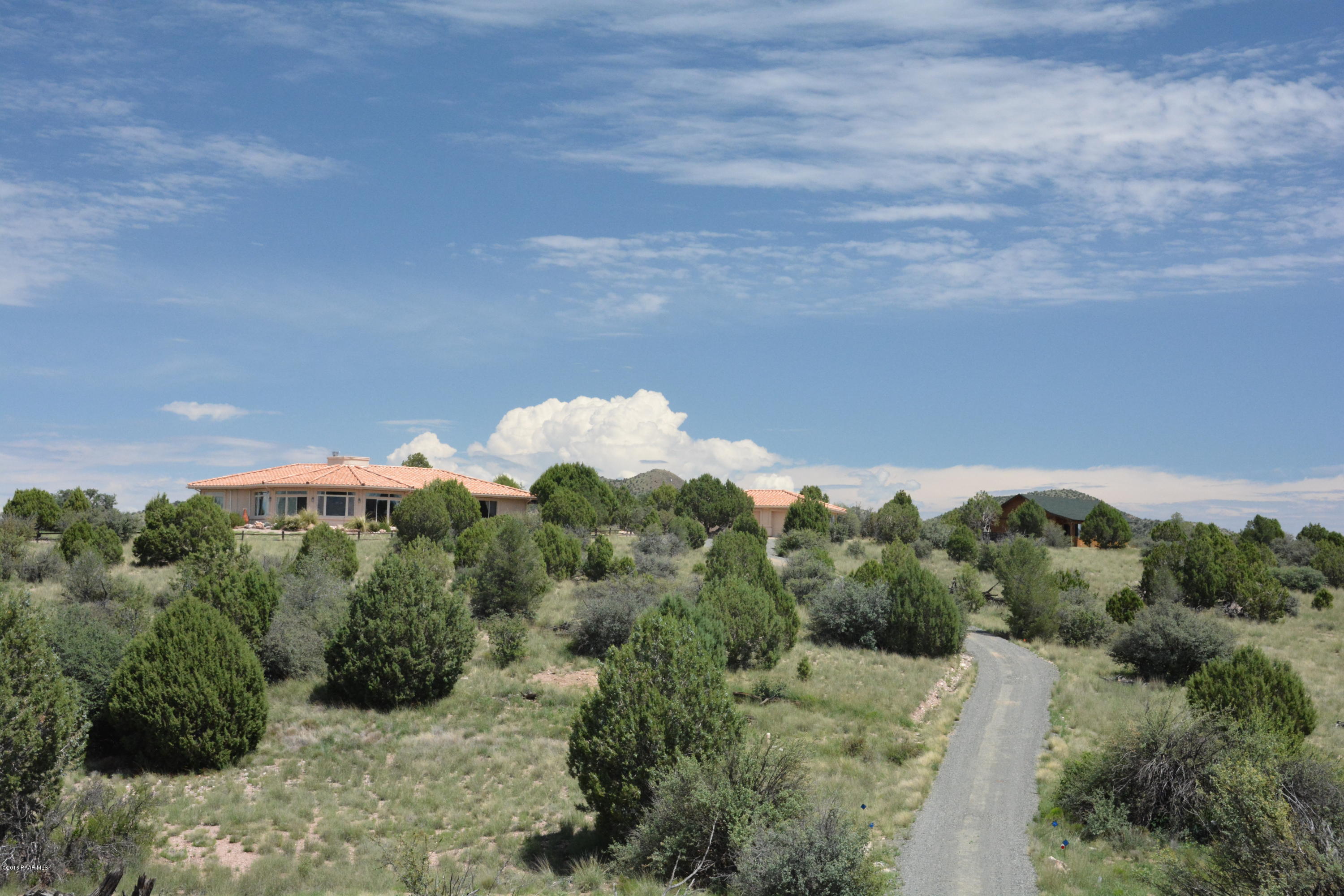 7200 Dillon Wash Road Prescott, AZ 86305 - Photo 3 of 47 a view of a city with lush green forest
