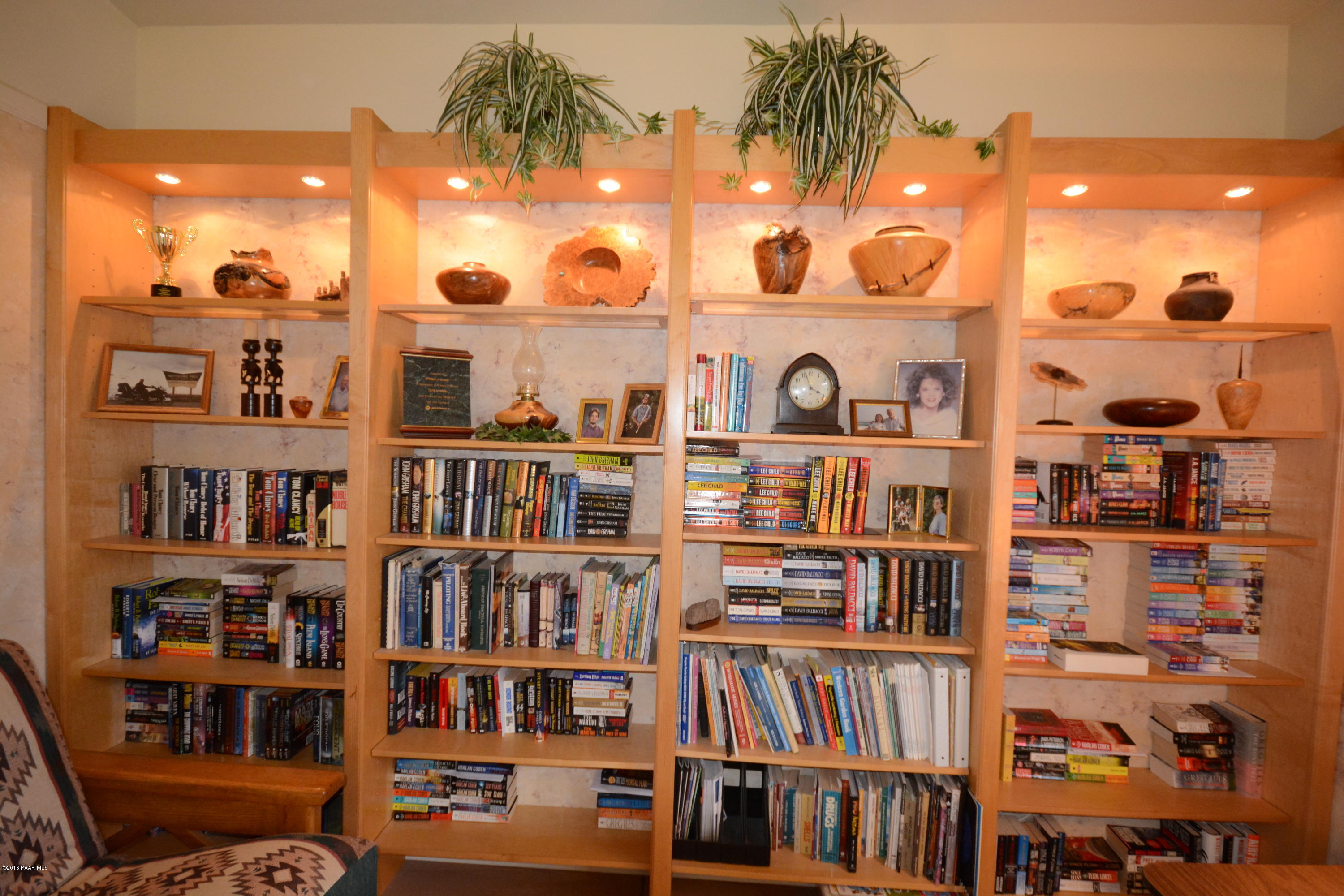 7200 Dillon Wash Road Prescott, AZ 86305 - Photo 31 of 47 a view of a room with lots of books and knick knacks on it