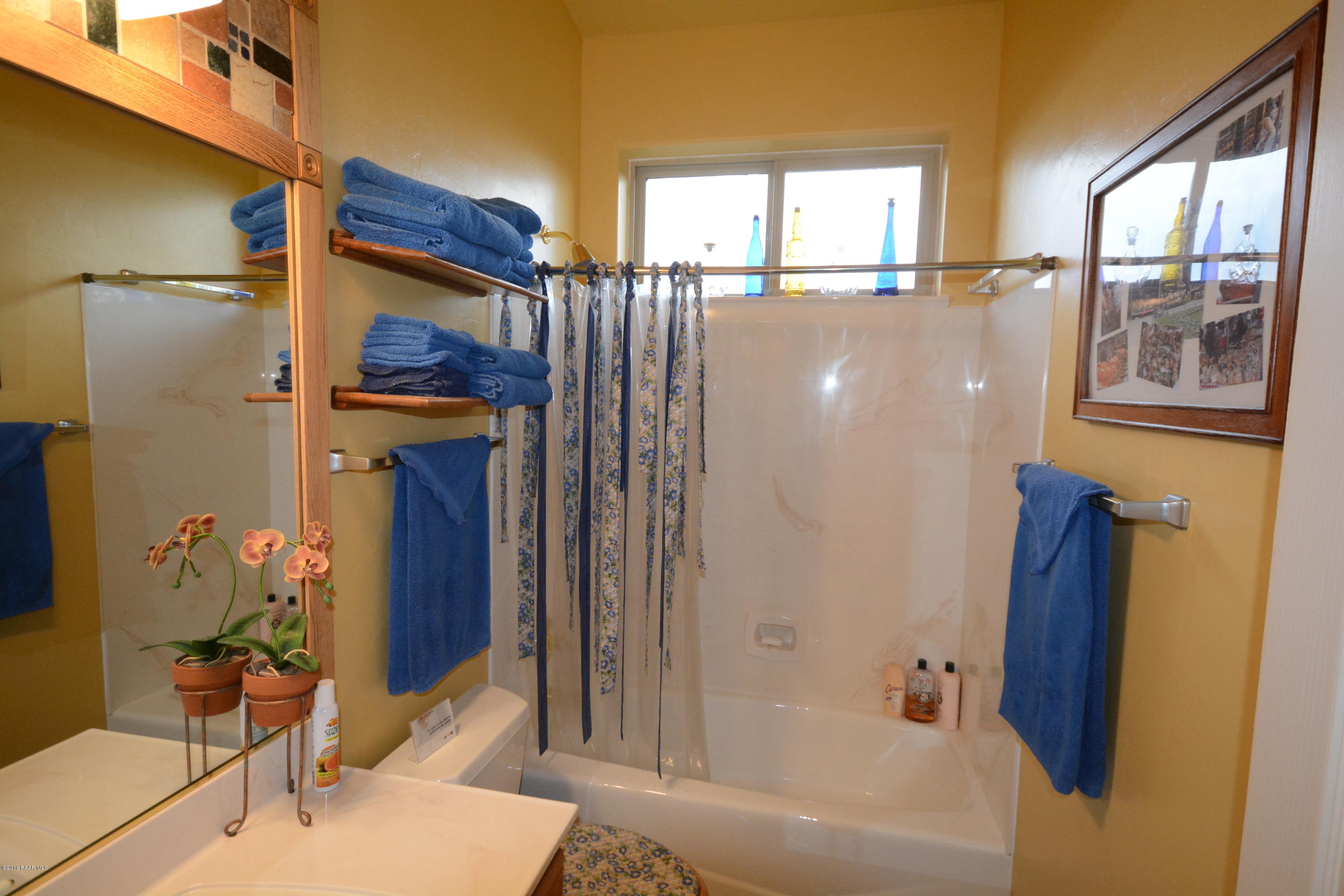 7200 Dillon Wash Road Prescott, AZ 86305 - Photo 35 of 47 a bathroom with a tub and shower