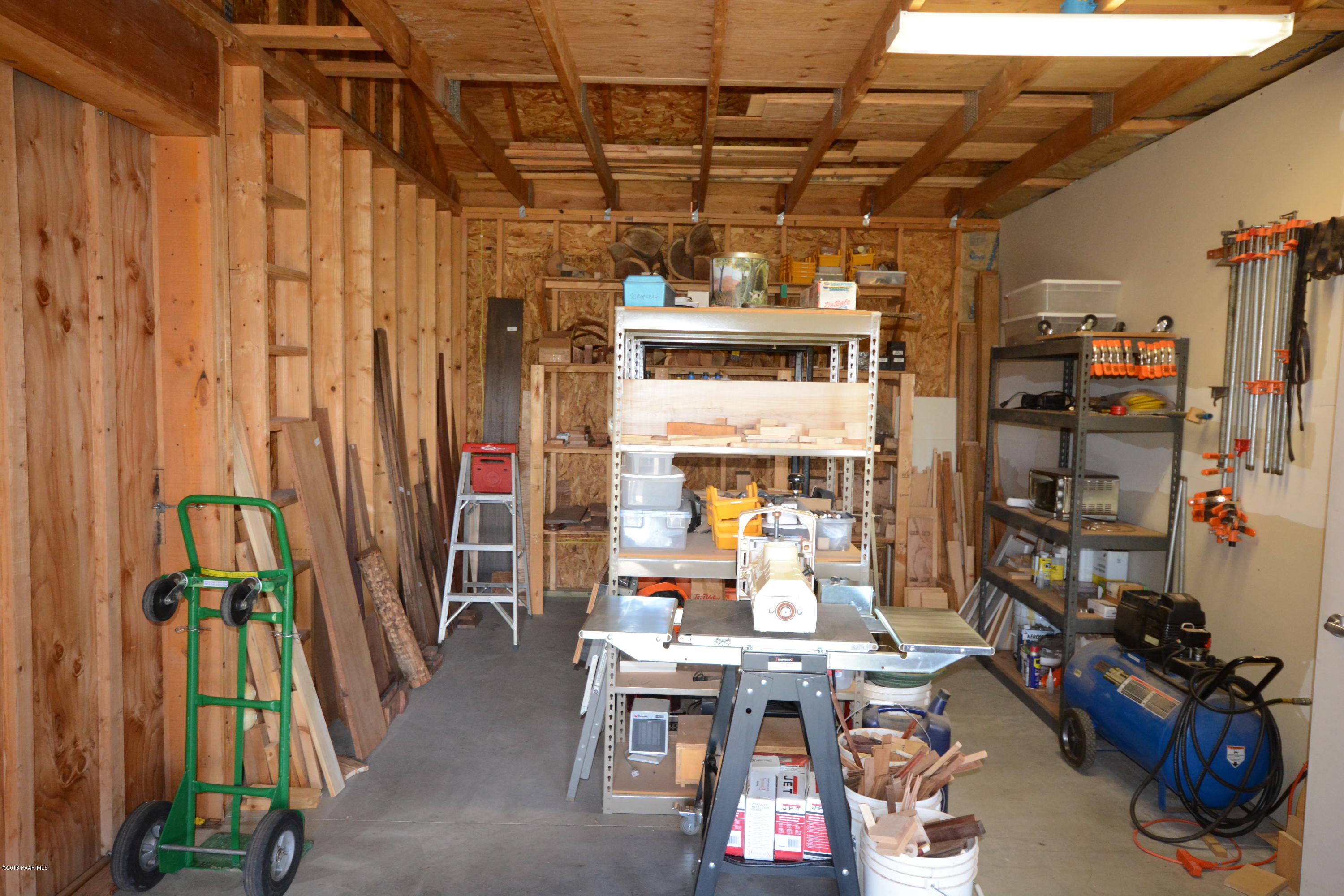 7200 Dillon Wash Road Prescott, AZ 86305 - Photo 45 of 47 a view of a storage room with shelves