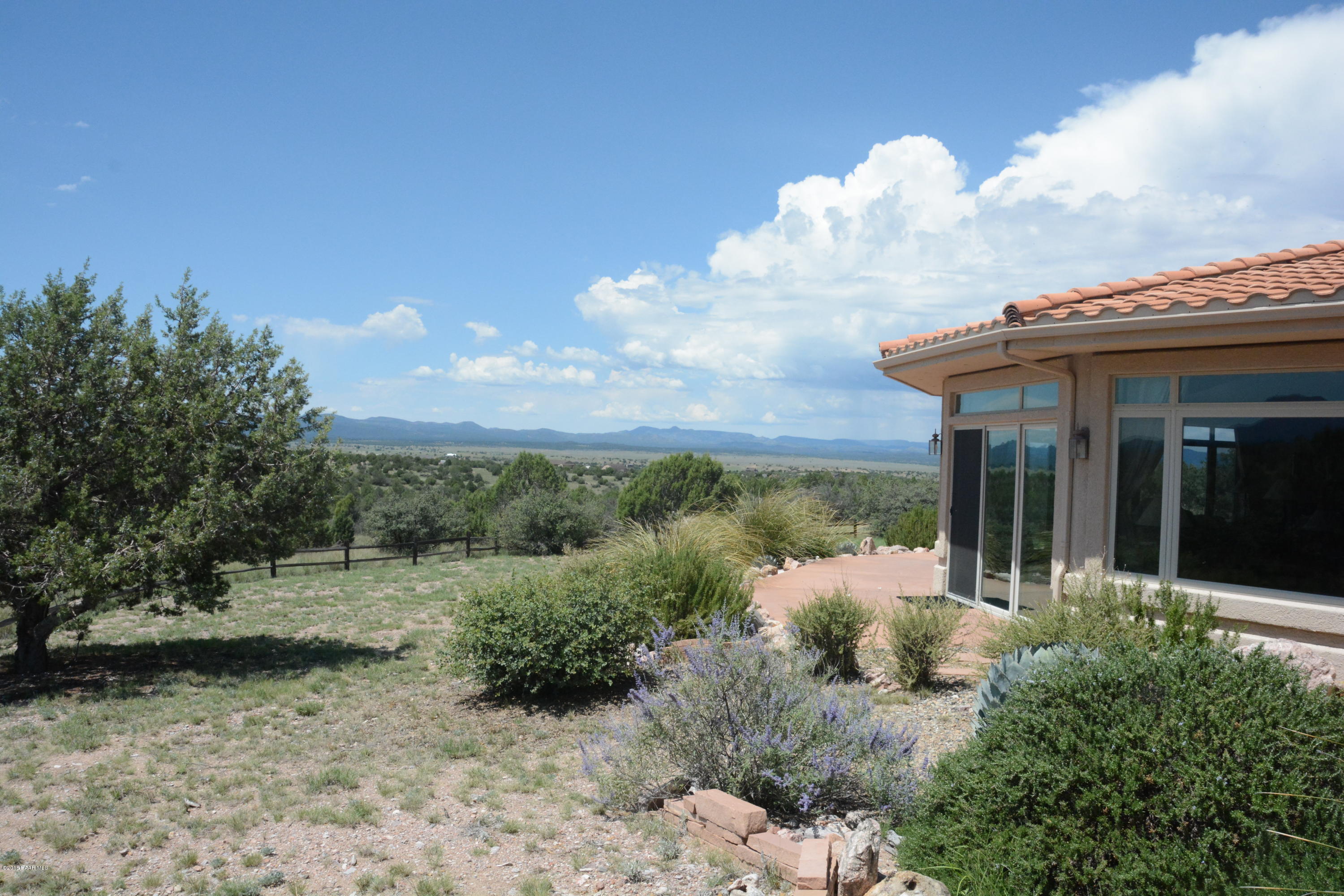 7200 Dillon Wash Road Prescott, AZ 86305 - Photo 7 of 47 a view of a house with a yard