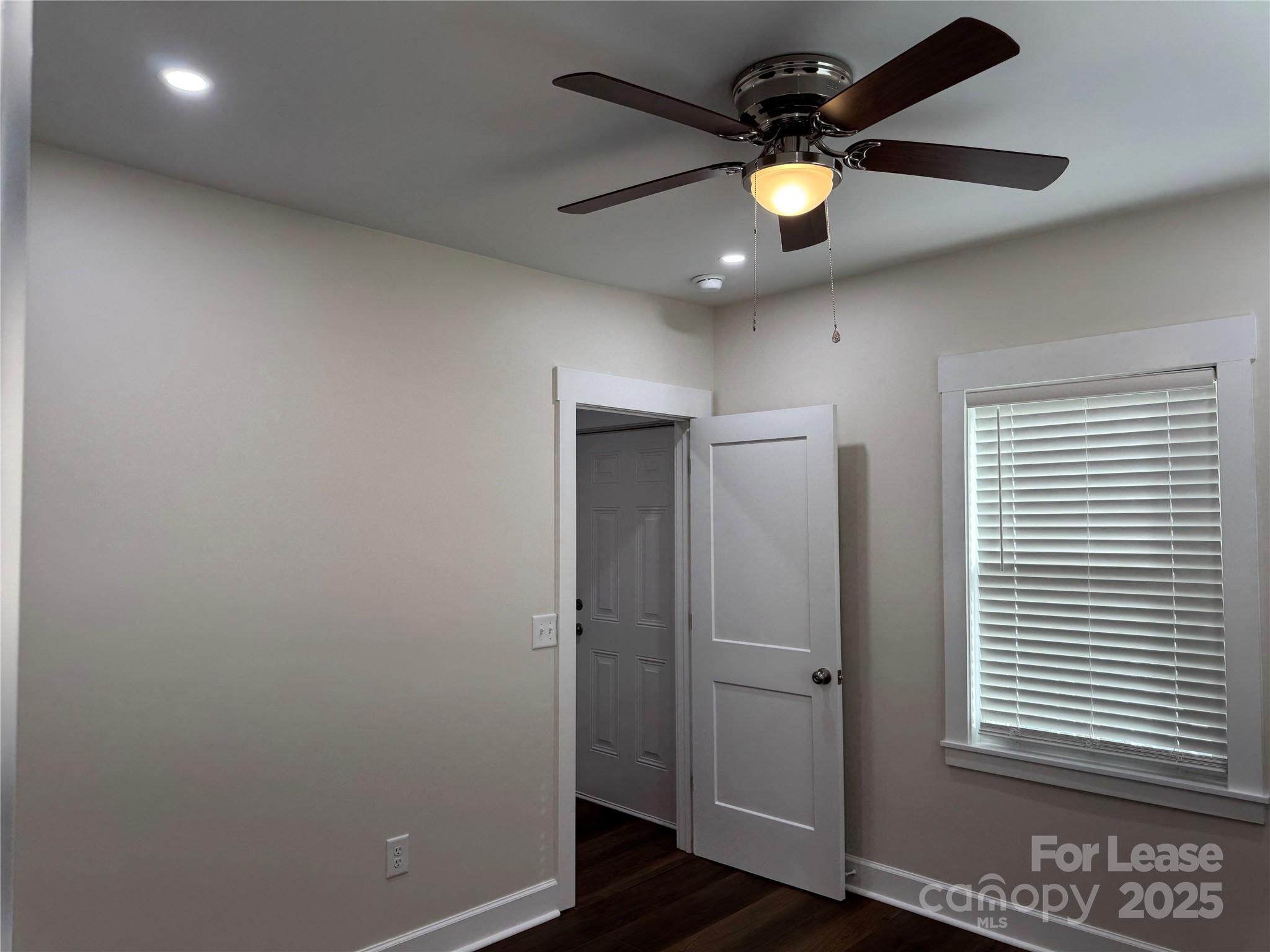 632 Graham Street Albemarle, NC 28001 - Photo 15 of 18 a view of an empty room and window