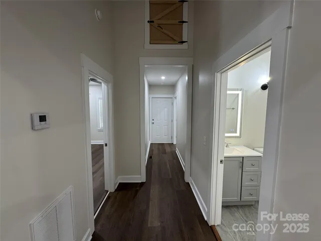 a view of hallway with stairs