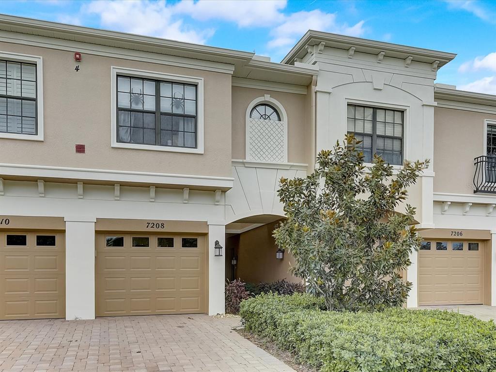 7208 Hamilton Road Bradenton, FL 34209 - Photo 1 of 1 a front view of a house with garden