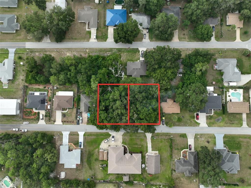 Southeast 157th Street Summerfield, FL 34491 - Photo 2 of 6 an aerial view of a house with outdoor space swimming pool and outdoor seating