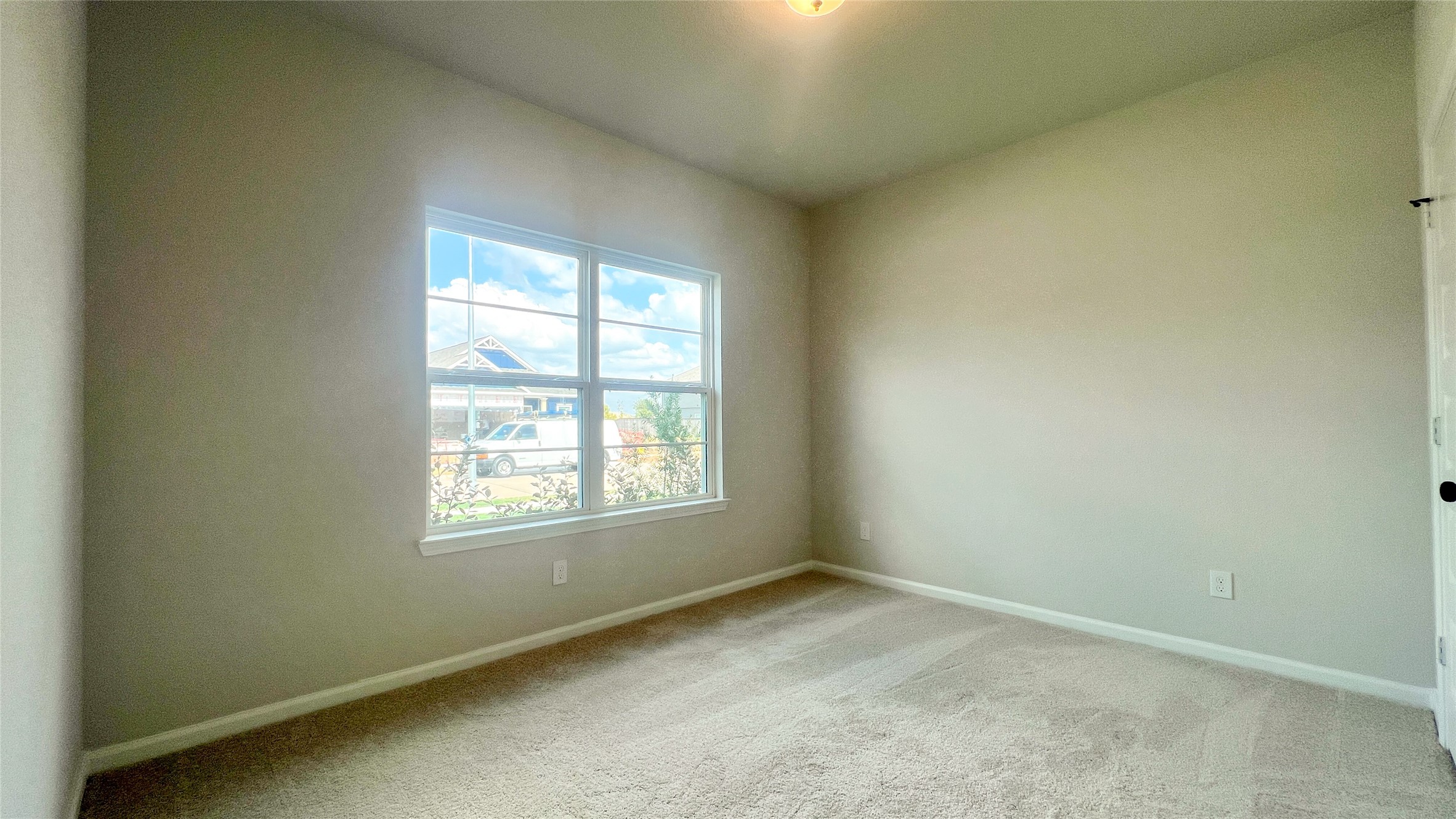 8126 Red Shiner Way Fulshear, TX 77441 - Photo 11 of 20 an empty room with a window