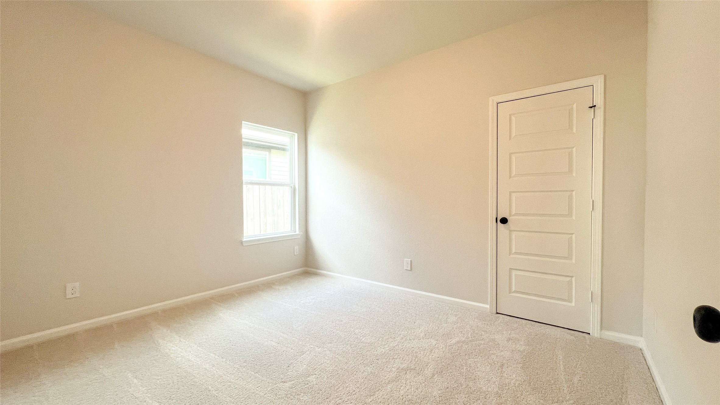 8126 Red Shiner Way Fulshear, TX 77441 - Photo 13 of 20 an empty room with windows