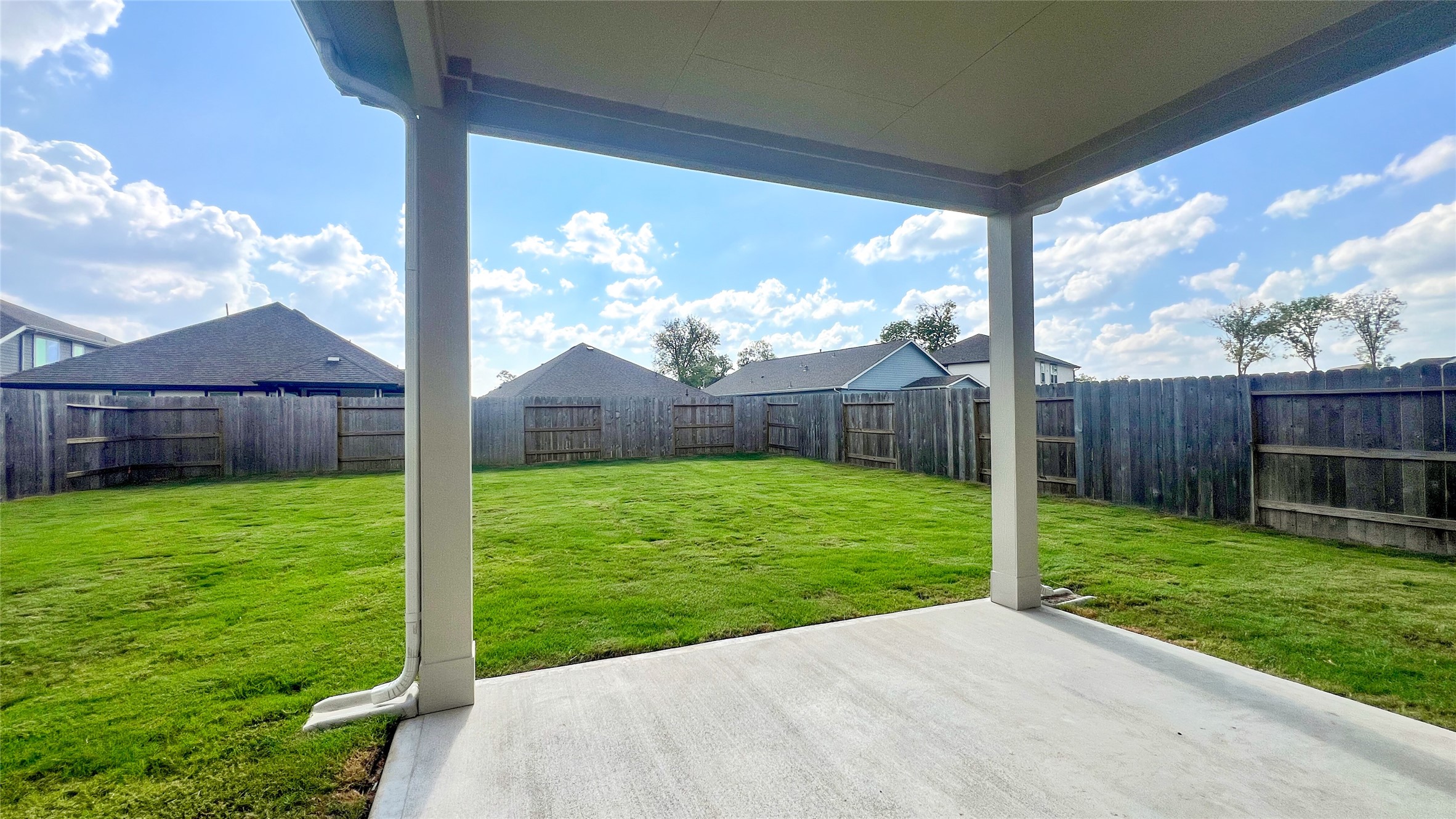 8126 Red Shiner Way Fulshear, TX 77441 - Photo 18 of 20 a view of a backyard with a garden