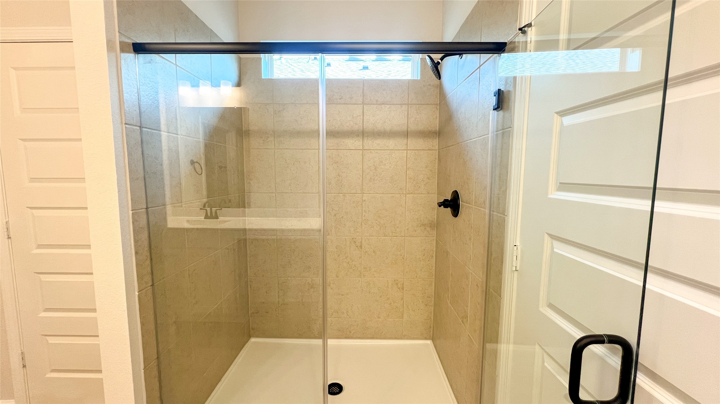 8126 Red Shiner Way Fulshear, TX 77441 - Photo 9 of 20 a bathroom with a shower