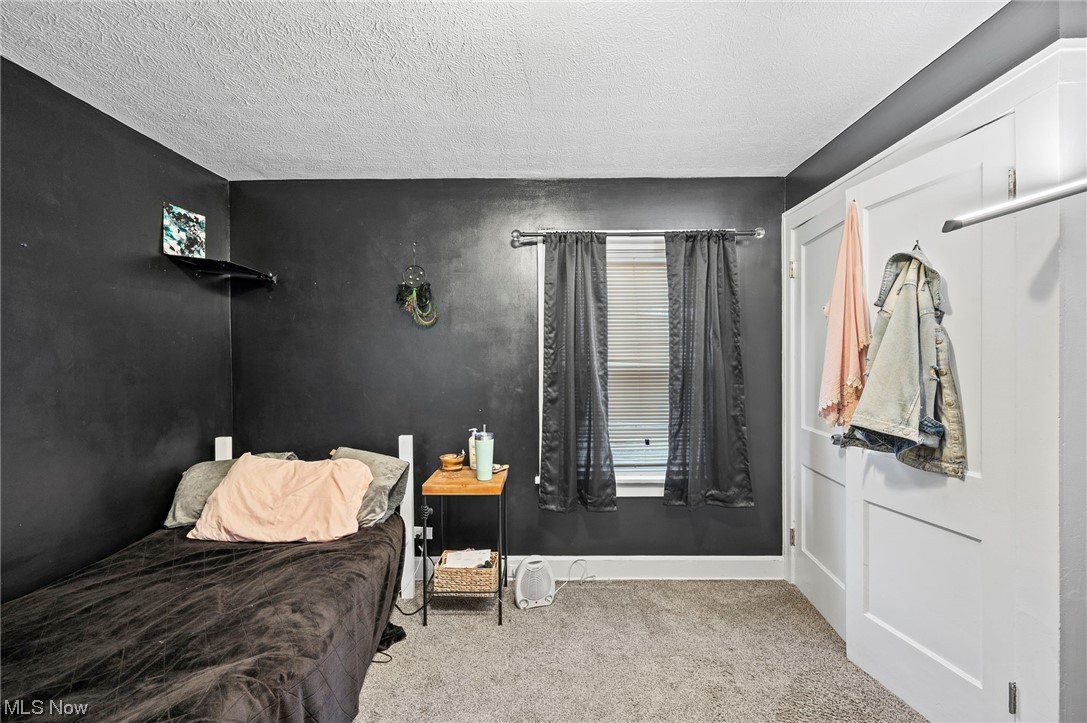 3305 Kildare Road Cleveland, OH 44118 - Photo 28 of 33 Carpeted bedroom featuring a textured ceiling