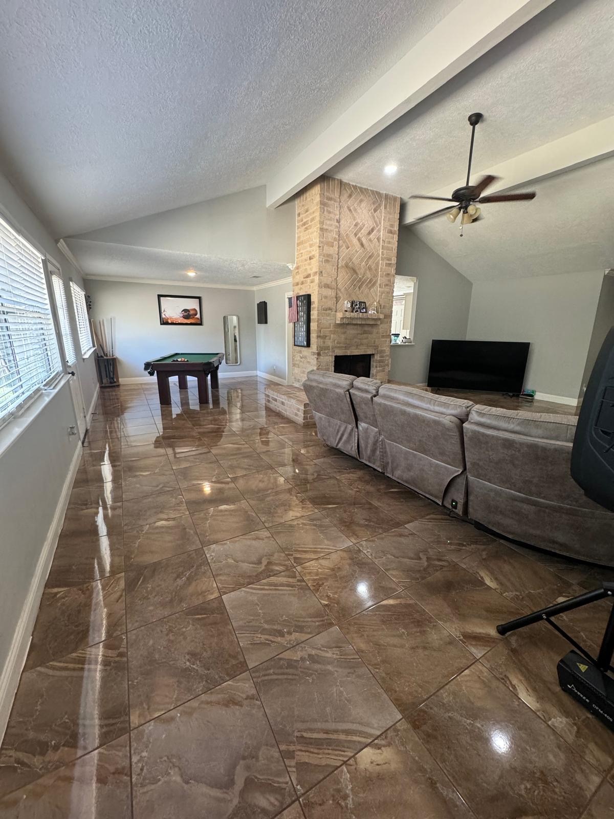 21418 Bassbrook Drive Spring, TX 77388 - Photo 22 of 29 a living room with furniture and a fireplace