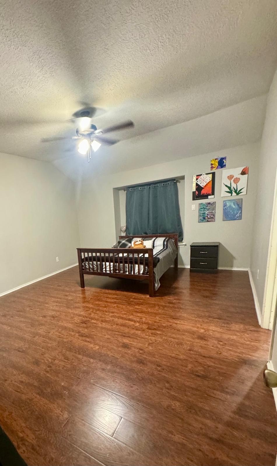 21418 Bassbrook Drive Spring, TX 77388 - Photo 25 of 29 a view of a room with furniture and chandelier fan