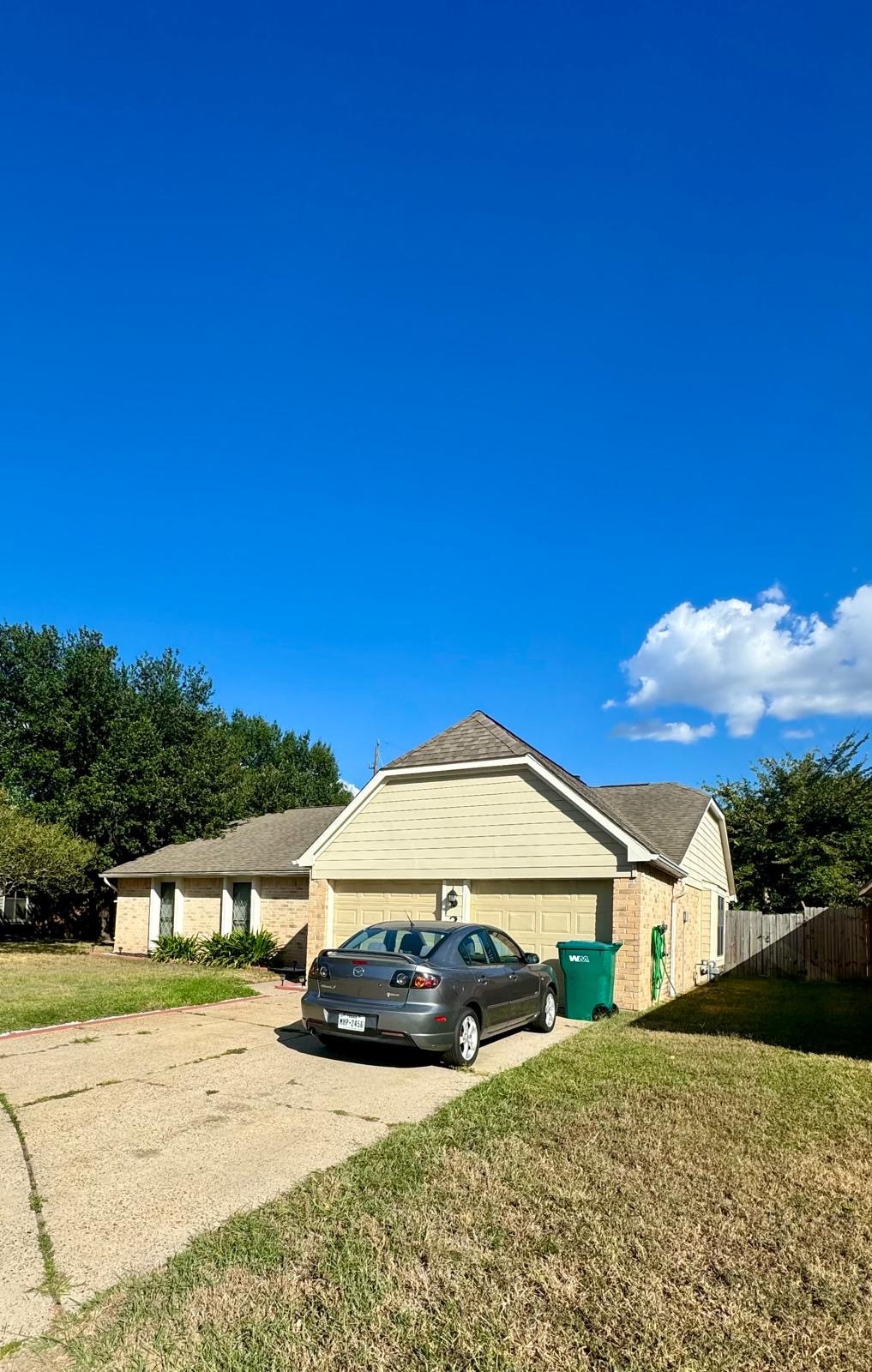 21418 Bassbrook Drive Spring, TX 77388 - Photo 5 of 29 a view of a house with a yard