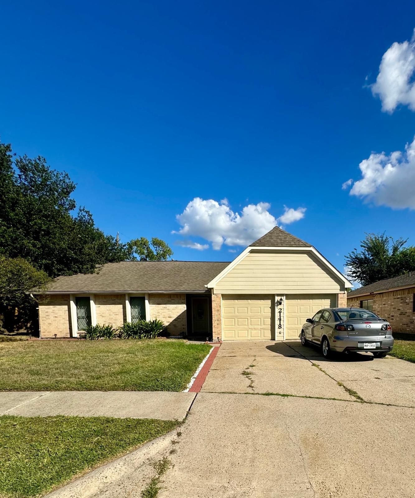 21418 Bassbrook Drive Spring, TX 77388 - Photo 6 of 29 a view of a house with a yard