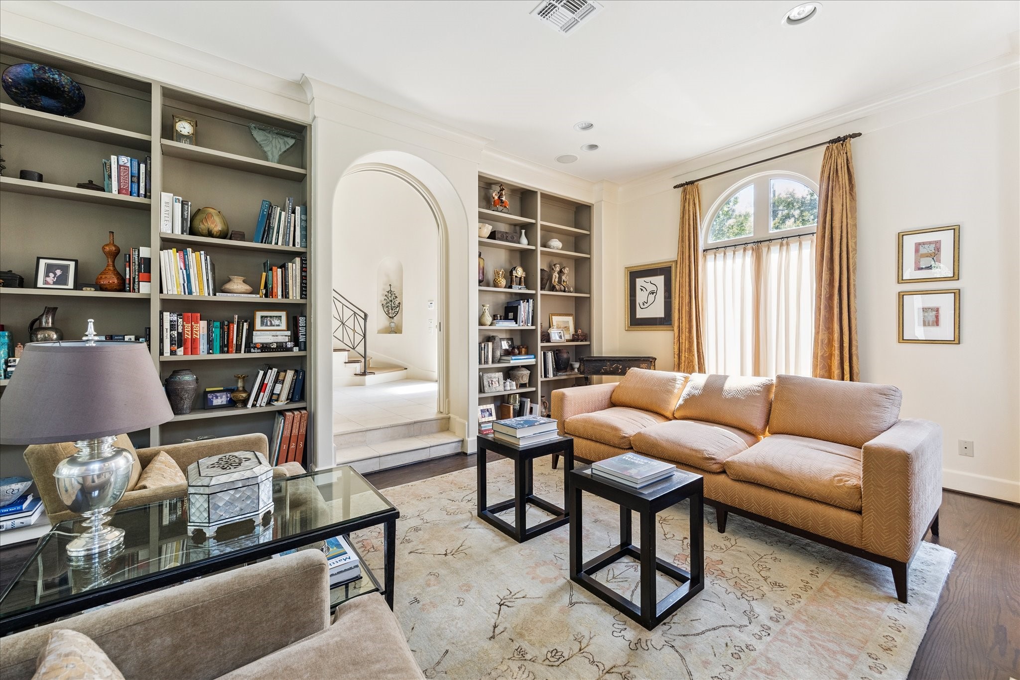 1804 Bolsover Street Houston, TX 77005 - Photo 11 of 46 a living room with furniture and a book shelf