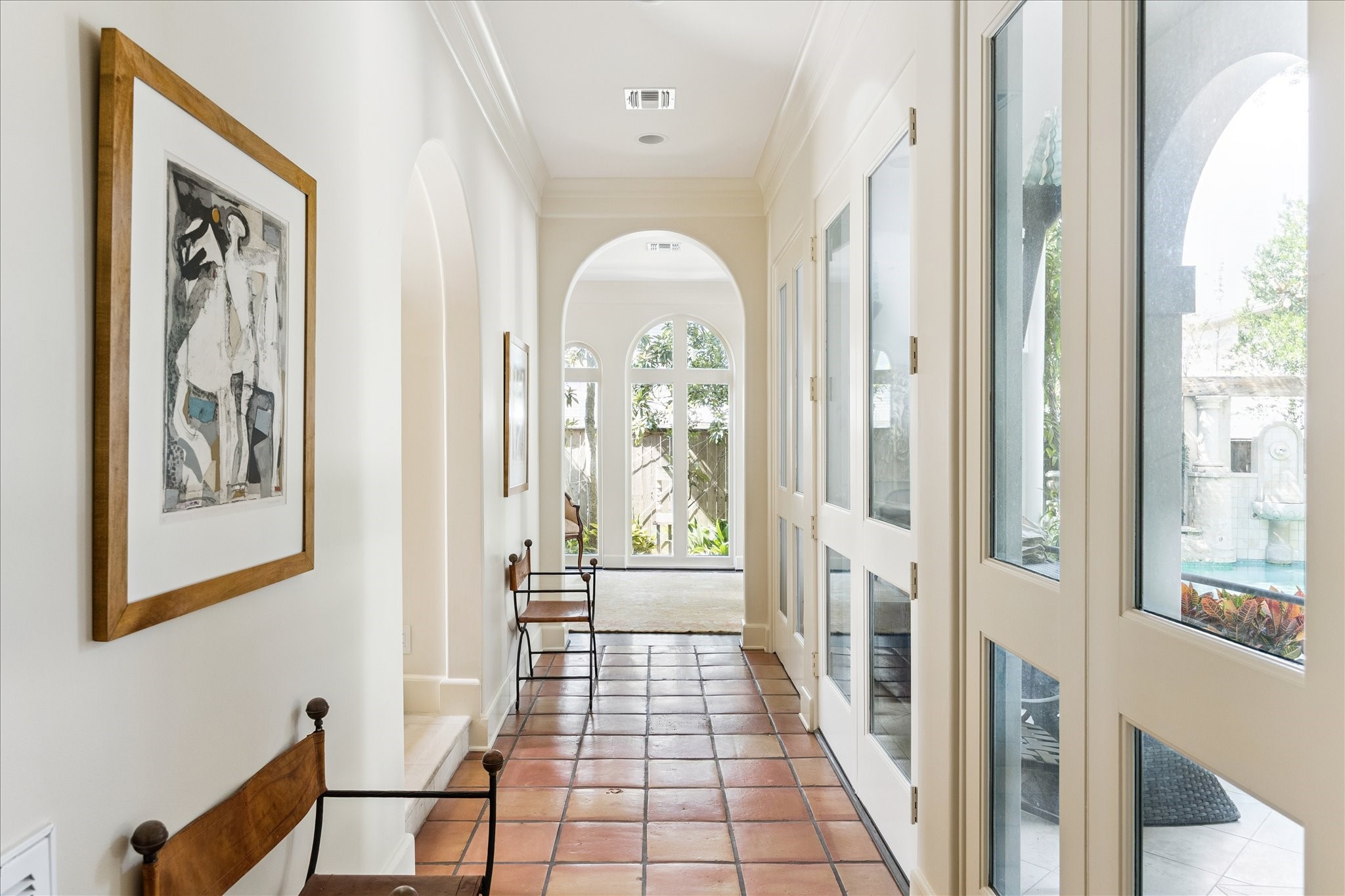 1804 Bolsover Street Houston, TX 77005 - Photo 15 of 46 a view of a hallway with wooden floor and a dining room view