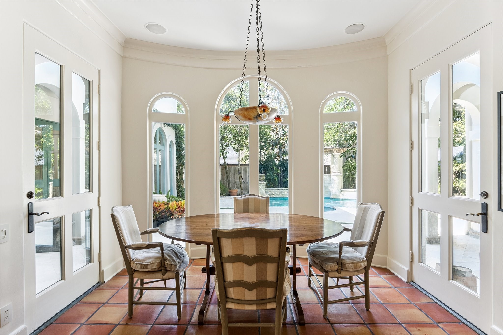 1804 Bolsover Street Houston, TX 77005 - Photo 16 of 46 a dining room with furniture a chandelier and wooden floor
