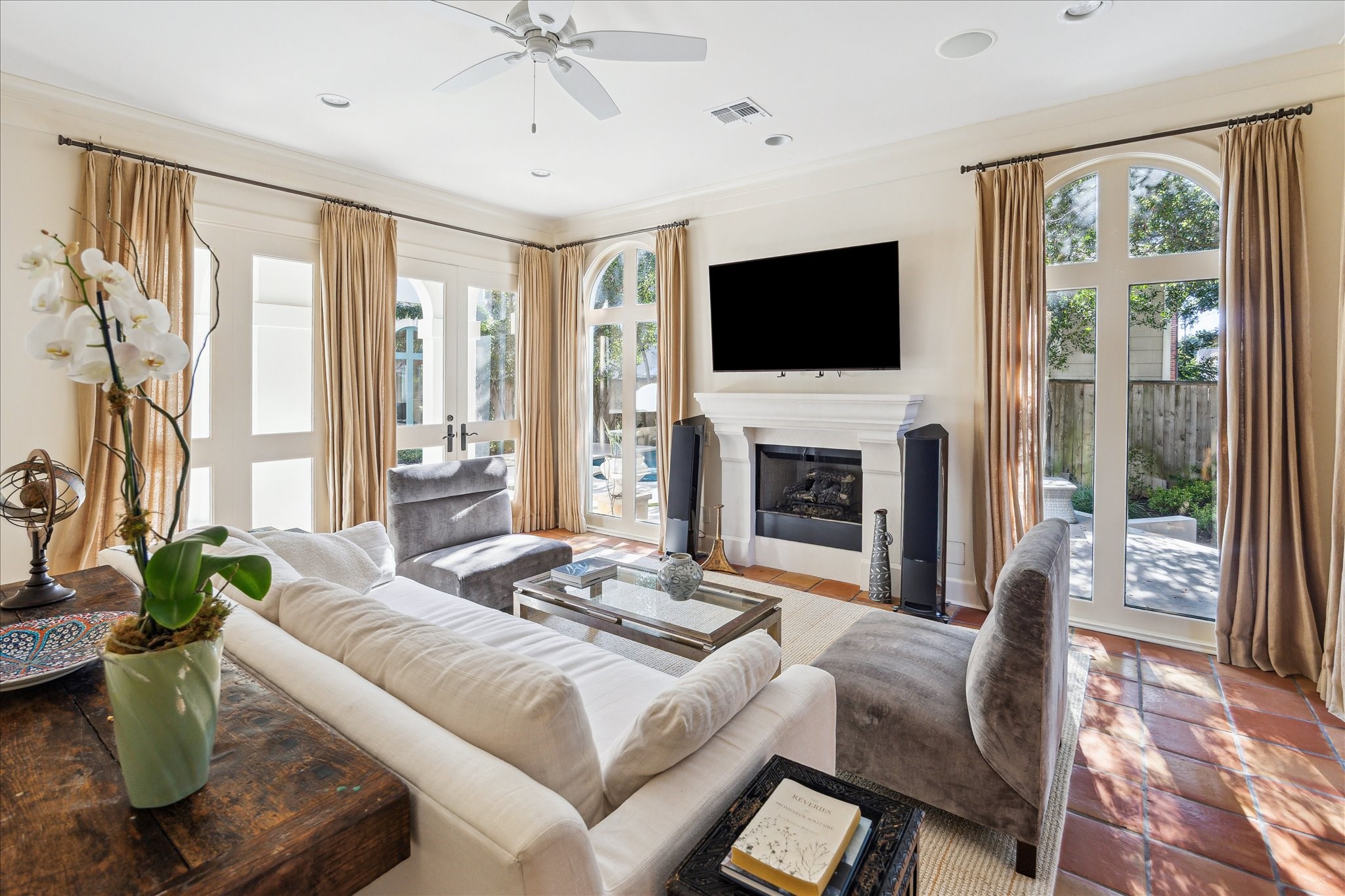 1804 Bolsover Street Houston, TX 77005 - Photo 17 of 46 a living room with furniture fireplace and a flat screen tv