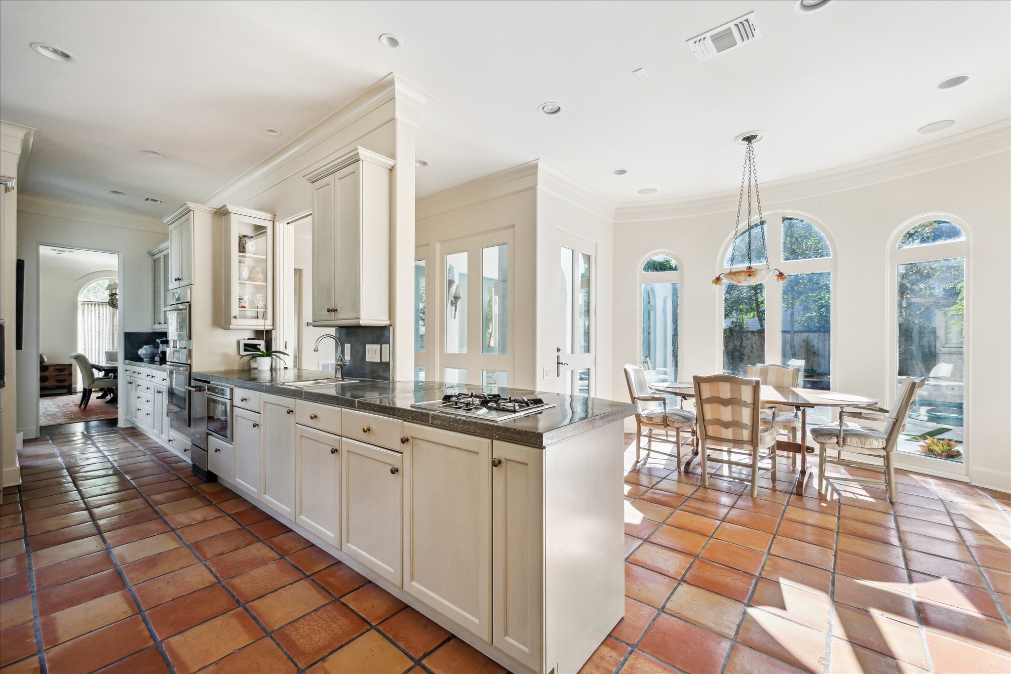 1804 Bolsover Street Houston, TX 77005 - Photo 20 of 46 a large kitchen with kitchen island granite countertop a large counter top and living room