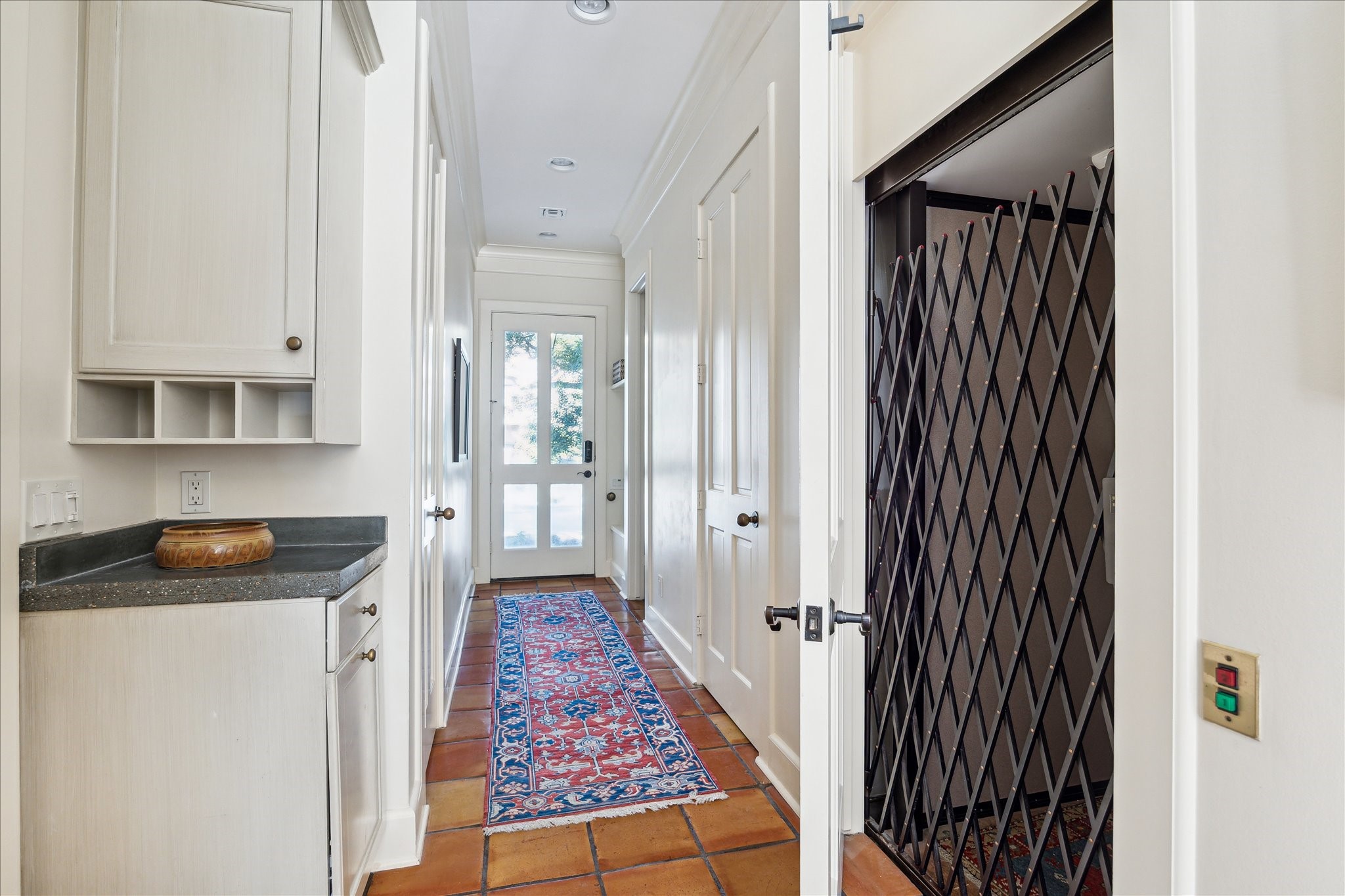 1804 Bolsover Street Houston, TX 77005 - Photo 22 of 46 a kitchen with white cabinets and counter space